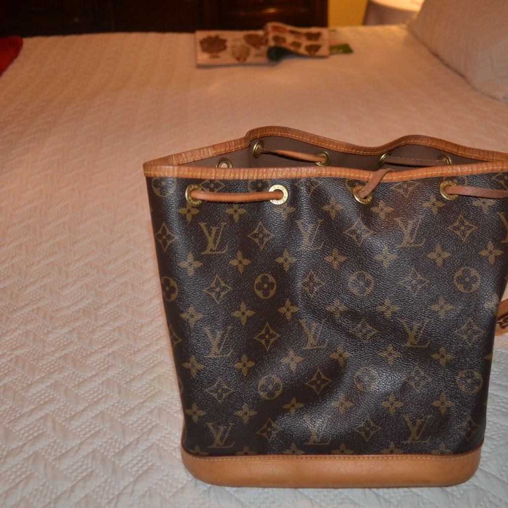 A genuine Louis Vuitton with orginal box and cover